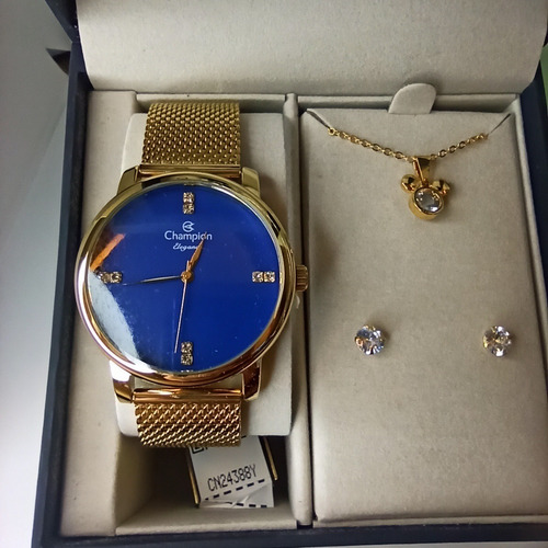 Imagem 2 de 5 de # Relógio Champion Feminino Dourado Com Fundo Azul Barato