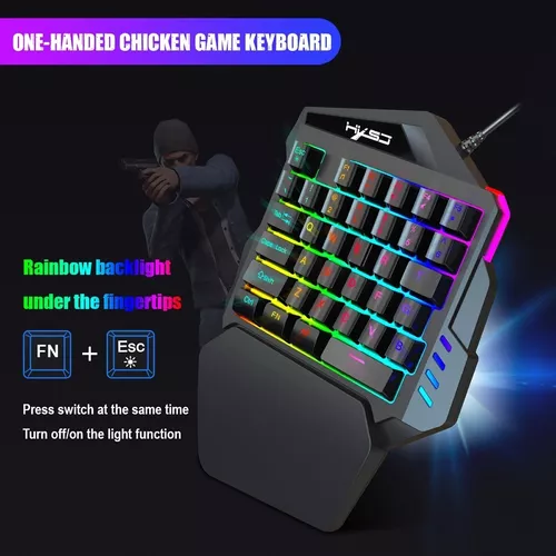 Teclado gamer HXSJ V100 color negro con luz rainbow Nuevo
