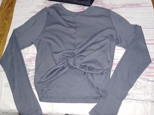 Imagen 4 de 5 de Ropa