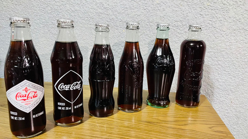 Colección De Botellas De Coca Cola