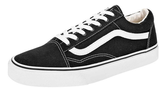 vans negros con raya blanca