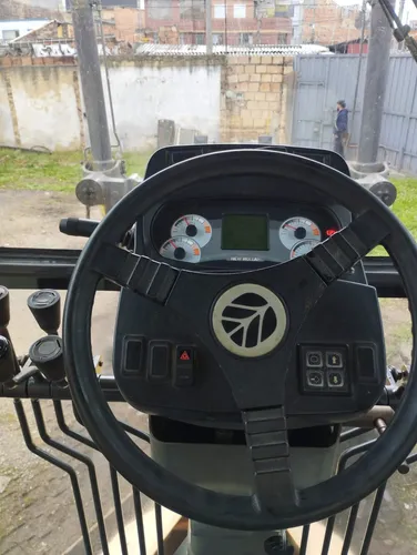 Motoniveladora Newholland 170b