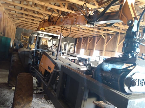 Munck Hegeza E Trator Valtra Bm110