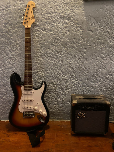 Guitarra Eléctrica Sx Strat Sunburst Con Funda+amplificador