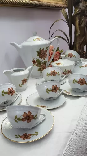 Jogo antigo de chá em porcelana filetado a ouro Antiquário Mala e Cuia  Antiguidades 