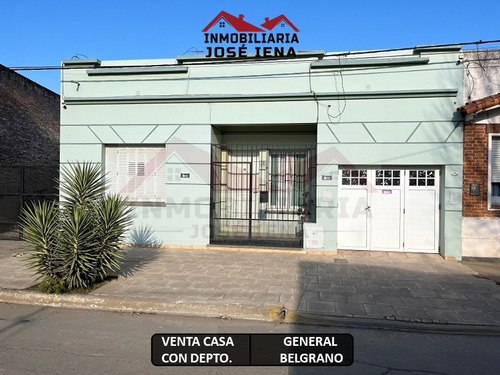 Casa 2 Dormitorios Con Departamento Al Fondo - Zona Céntro De General Belgrano. Calle Saavedra E/ Guemes Y Funes.