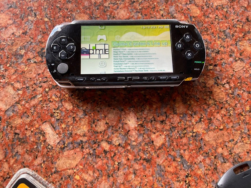 Psp-1004 Sony Portátil Completo 3 Jgos. + 2 Peliculas Origin (Usado)