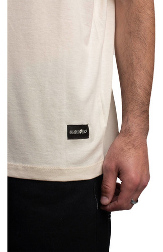 Imagen 3 de 3 de Remera De Hombre Woodoo X Savoir Faire Spot - Bone