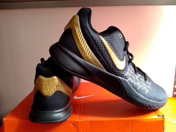 tenis nike dorados