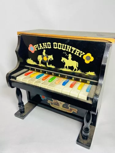 Piano Infantil em Madeira da Hering. Emite Som, porém n