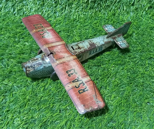 Antiguo Avión De Juguete Chapa Litografiada A Cuerda