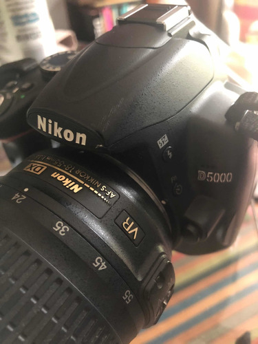 Nikon D5000 + Lente