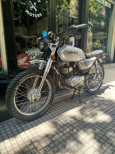 Suzuki Ax 100