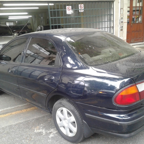 Mazda 323 1.7 Sedan Glx