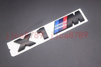 Imagen 6 de 9 de Emblema Bmw X1 M Cajuela Medida 14.5 X 2.5 Cms Negro O Cromo