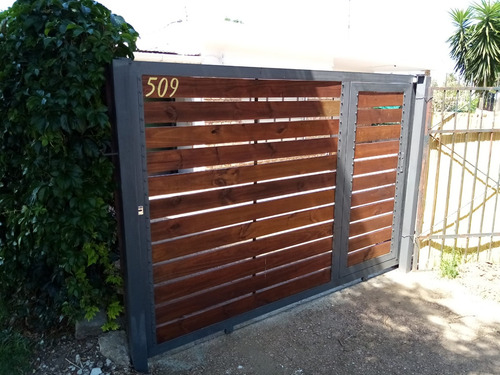 Imagen 11 de 12 de Rejas Puertas Rejas Y Cerramientos En Hierro Y Madera