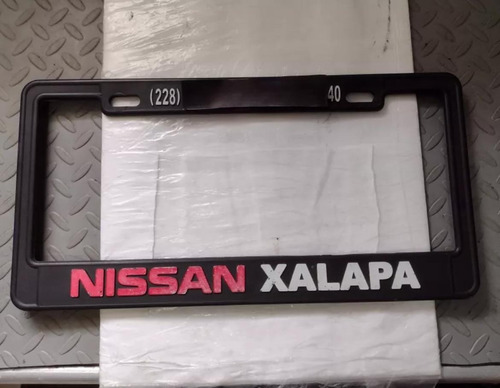 Porta Placa Nissan Xalapa Original De Uso
