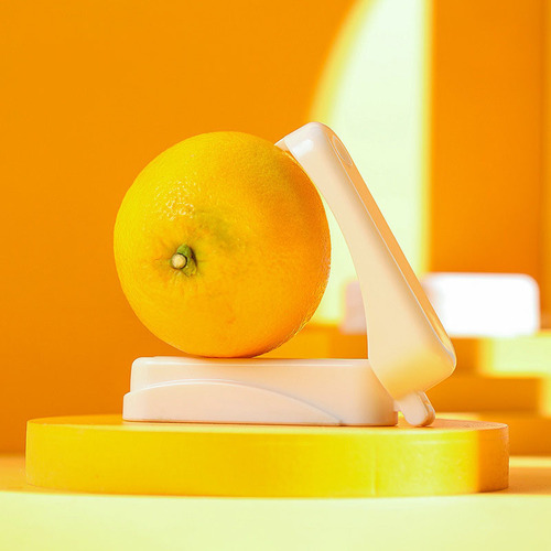 Un Pelador De Naranjas Para Abrir La Cáscara De Pomelo Orang