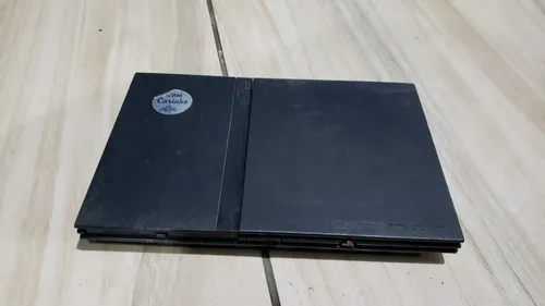 comprar Playstation 2 Slim 77001 Só O Aparelho Sem Nada  Com Defeito E Com Chip... Video Com Defeito E Som Bom. Controles Ruins