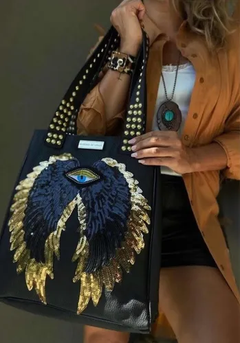 Mujeres de linaje bags hotsell