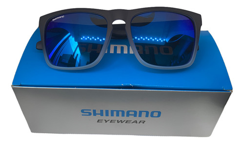 Óculos De Sol Shimano Abyss Azul Polarizado Armação Preta E Branca Lente Azul Polarizada
