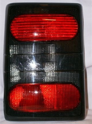 Farol Tra Der (fume) Renault Trafic86-01