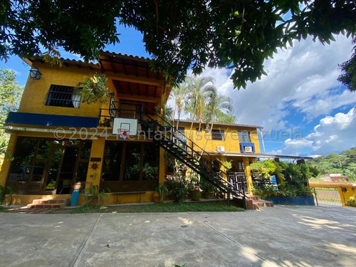 Julio Latouche 24-20805 Hermosa Casa En Alquiler Colinas De Guataparo Valencia, Amplias Áreas Verdes, Tanque De Agua 10.000 Lts.