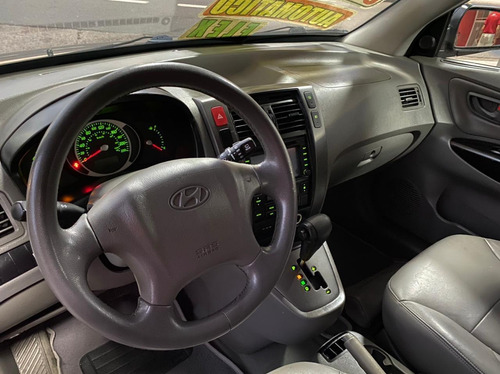 Imagem 11 de 14 de Hyundai Tucson Gls 2.0 Preta 2014 Couro Flex Automático
