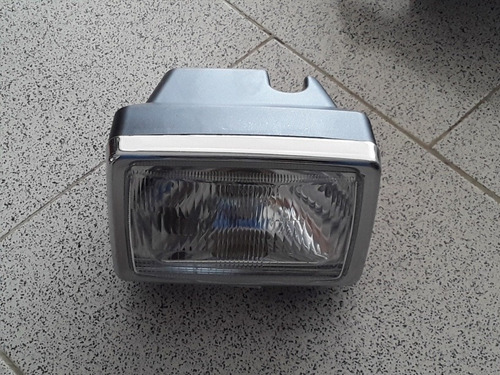 Imagen 1 de 1 de Faro Ax 100 Suzuki ( Mica De Vidrio )