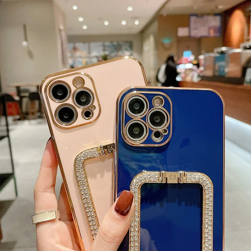 Capinha Genérica iPhone Suporte Strass Bumper 14 Pro Max