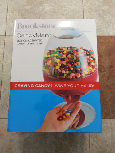 Brookstone Dispensador Candyman Candy Activado Movimiento