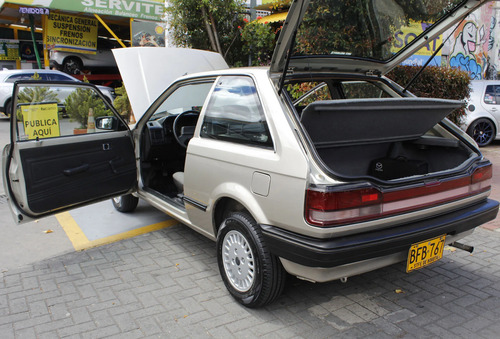 Mazda 323 1.3 He coupe
