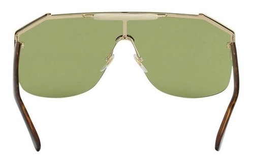 Anteojos de sol Gucci GG0291S con marco de metal color dorado, lente verde de nailon clásica, varilla habana