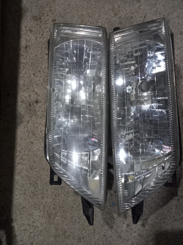 Faros Nissan Maxima 1997 1998 Originales Usados Par 