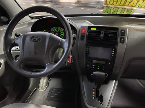 Imagem 9 de 14 de Hyundai Tucson Gls 2.0 Preta 2014 Couro Flex Automático