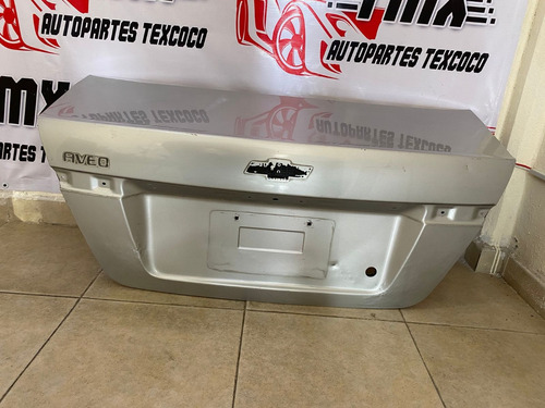 Tapa Cajuela Chevrolet Aveo 2012-2017 Linea V Detalle Mínimo