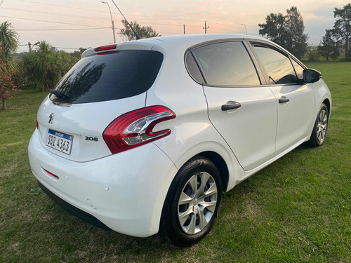 Imagen 12 de 16 de Peugeot 208 2015 1.0 Access 5p Francés