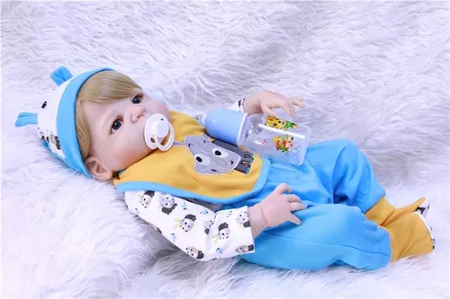 Boneca bebe reborn menino corpo de silicone roupa azul com babador