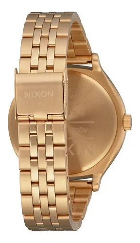 Precio reloj nixon dorado new arrivals