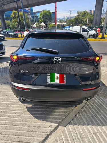 Mazda CX-30 5 pts. i Grand Touring, 2.5l, TA, piel, QC, RA-18