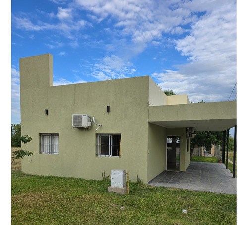 Alquiler De Casa En Oro Verde 2 Dormitorios Patio Y Cochera