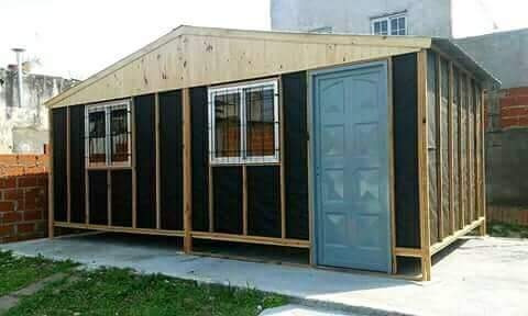 Imagen 15 de 18 de Prefabricada De 25m2 Con Aberturas De Madera Techo De Chapa