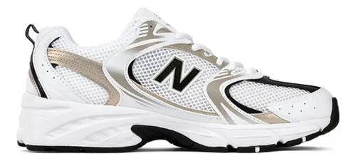 Gray new balance with gold hot sale