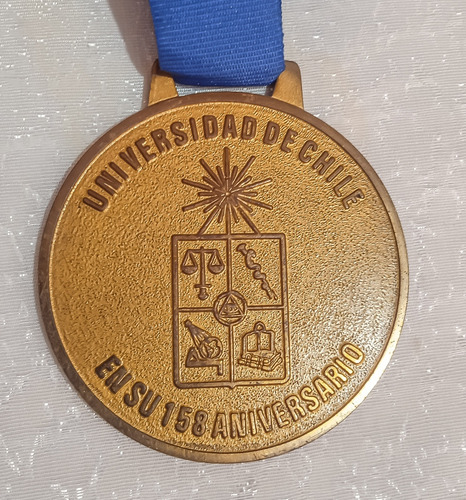 Medalla U. De Chile 158 Aniversario Humberto Maturana.