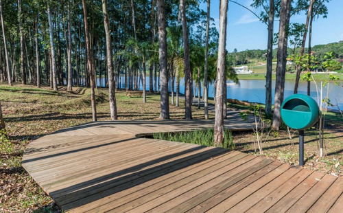 Terreno - Condomínio Luxuoso Ninho Verde I I Eco Residence-dois Clubes Com Piscinas,segurança 24 Hrs,playground,trilhas Ecológicas,ônibus Local.fotos Reais Do Terreno-quitado/iptu E Condomínio Em Dia