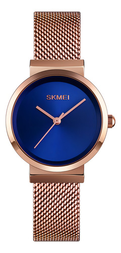 Relógio de pulso Skmei 1595 com corpo em ouro rosa, analógico, para mulheres, fundo azul, com pulseira de aço inoxidável cor de ouro rosa, ponteiros em ouro rosa, bisel em ouro rosa e fivela de gancho