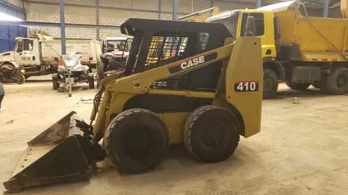 Mini Cargador Case 410 Modelo 2005