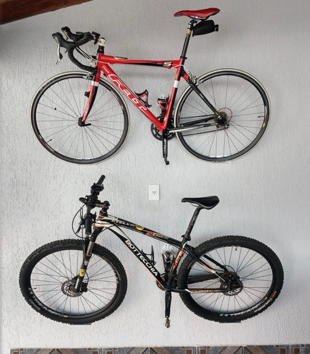 Imagem 8 de 10 de 2 Suportes Para Pendurar 2 Bicicletas Na Parede Com Trilhos P Troca Entre Modelos Mtb Speed + Furo Pra Tranca E Gabarito