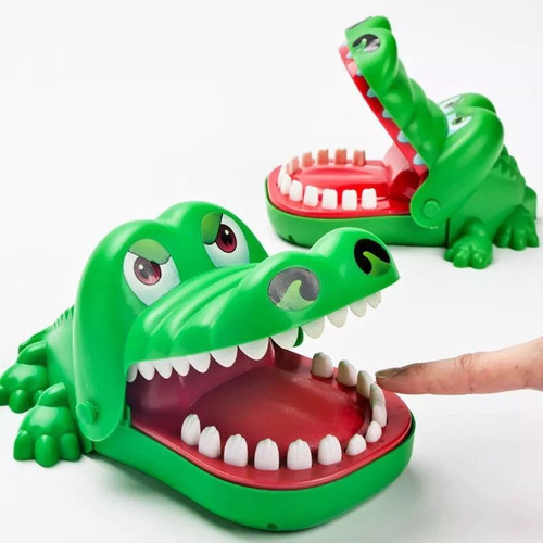 Para Cocodrilo Que Tira Los Dientes, Muerde Los Dedos,