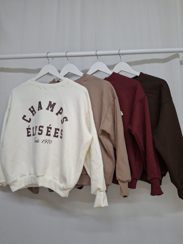 Buzo Con Envivado En Manga Y Estampado Centro Muniekshop